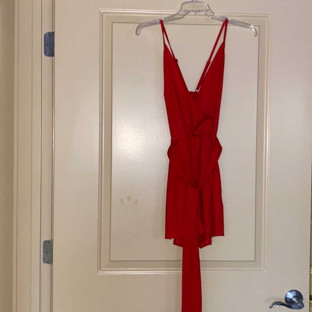 Women’s red jumper with spaghetti straps.